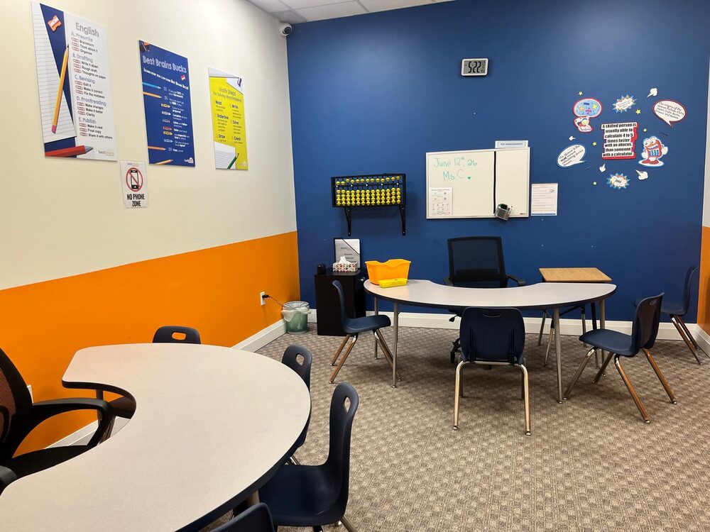 Classroom fully cleaned and set up with desks and whiteboard